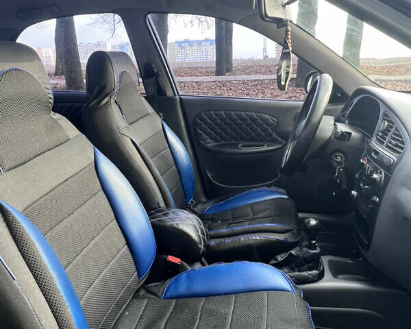 Синий Дэу Ланос, объемом двигателя 1.5 л и пробегом 130 тыс. км за 3400 $, фото 3 на Automoto.ua