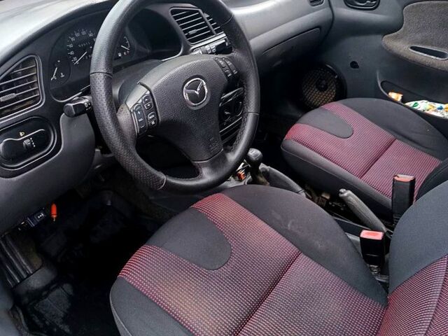 Синий Дэу Ланос, объемом двигателя 1.3 л и пробегом 153 тыс. км за 2000 $, фото 9 на Automoto.ua