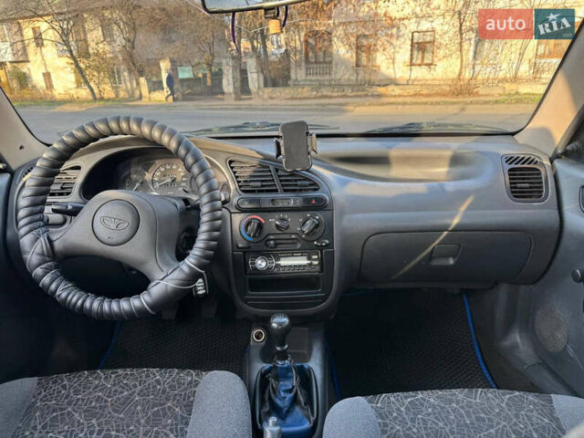 Синій Деу Ланос, об'ємом двигуна 1.5 л та пробігом 300 тис. км за 1999 $, фото 8 на Automoto.ua