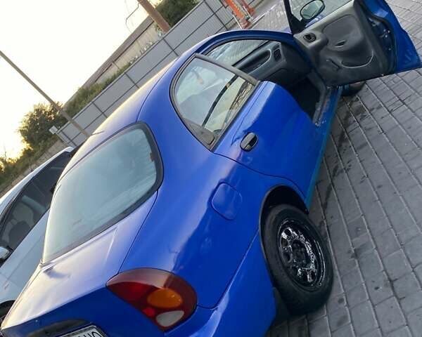 Синій Деу Ланос, об'ємом двигуна 1.5 л та пробігом 280 тис. км за 1100 $, фото 3 на Automoto.ua