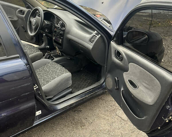 Синій Деу Ланос, об'ємом двигуна 1.5 л та пробігом 200 тис. км за 1250 $, фото 10 на Automoto.ua
