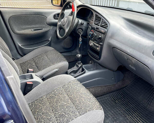 Синий Дэу Ланос, объемом двигателя 1.5 л и пробегом 208 тыс. км за 2200 $, фото 14 на Automoto.ua