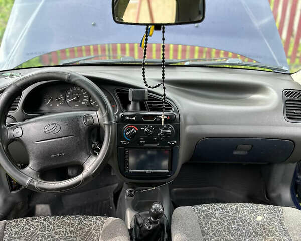 Синій Деу Ланос, об'ємом двигуна 1.6 л та пробігом 280 тис. км за 1350 $, фото 4 на Automoto.ua
