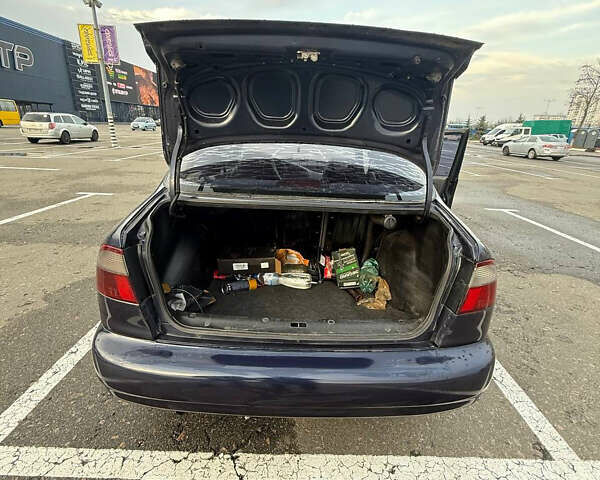 Синий Дэу Ланос, объемом двигателя 1.5 л и пробегом 340 тыс. км за 2400 $, фото 10 на Automoto.ua