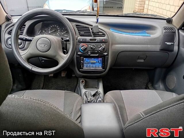 Синий Дэу Ланос, объемом двигателя 1.5 л и пробегом 187 тыс. км за 2250 $, фото 8 на Automoto.ua