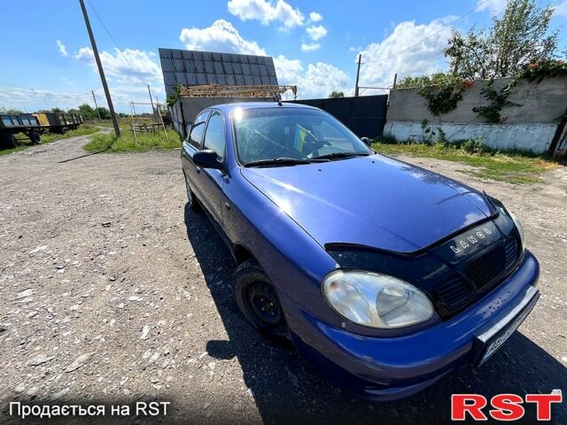 Синій Деу Ланос, об'ємом двигуна 1.3 л та пробігом 272 тис. км за 1600 $, фото 5 на Automoto.ua