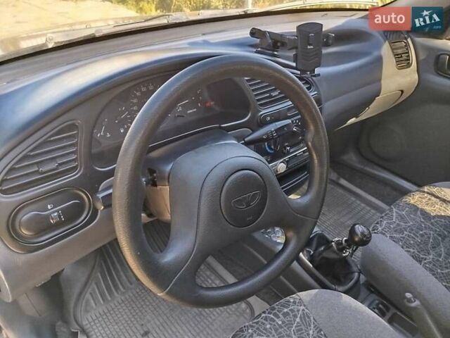 Синий Дэу Ланос, объемом двигателя 1.5 л и пробегом 152 тыс. км за 2500 $, фото 11 на Automoto.ua