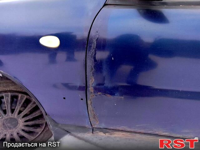 Синий Дэу Ланос, объемом двигателя 15 л и пробегом 812 тыс. км за 1300 $, фото 7 на Automoto.ua