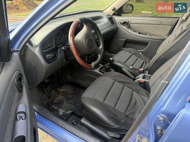 Синий Дэу Ланос, объемом двигателя 1.5 л и пробегом 180 тыс. км за 1500 $, фото 8 на Automoto.ua