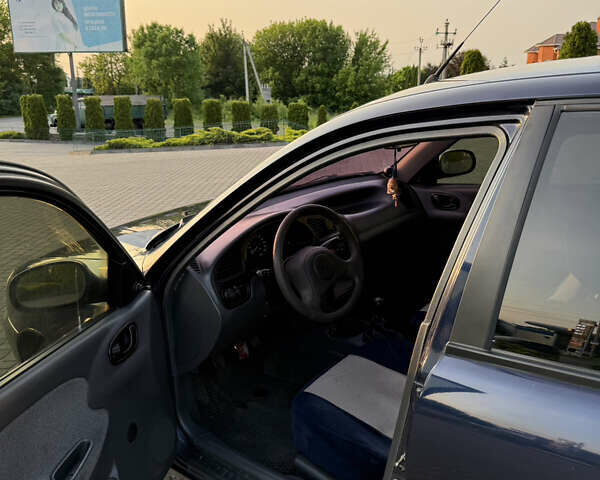 Дэу Ланос 2006 в Хмельницком на Automoto.ua Синий Дэу Ланос, объемом двигателя 1.5 л и пробегом 204 тыс. км за 2199 $, фото 5 на Automoto.ua
