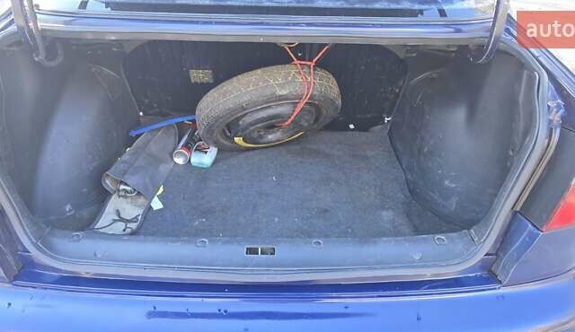 Синий Дэу Ланос, объемом двигателя 1.5 л и пробегом 345 тыс. км за 1800 $, фото 9 на Automoto.ua