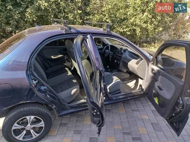 Синий Дэу Ланос, объемом двигателя 1.5 л и пробегом 152 тыс. км за 2500 $, фото 6 на Automoto.ua