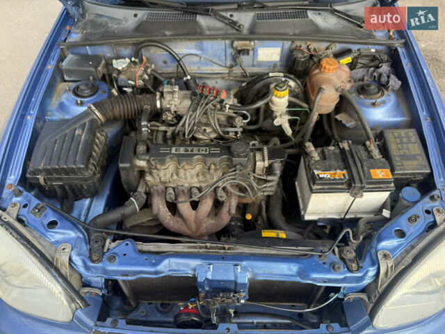 Синий Дэу Ланос, объемом двигателя 1.5 л и пробегом 180 тыс. км за 1500 $, фото 7 на Automoto.ua