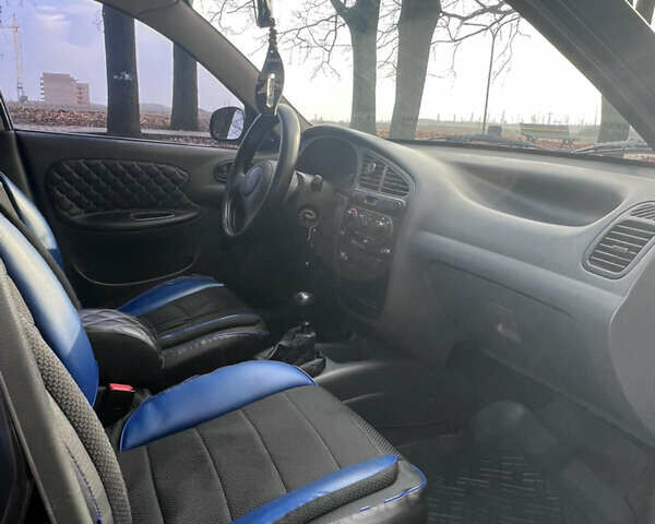 Синий Дэу Ланос, объемом двигателя 1.5 л и пробегом 130 тыс. км за 3400 $, фото 2 на Automoto.ua