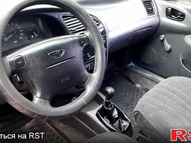 Синий Дэу Ланос, объемом двигателя 1.5 л и пробегом 280 тыс. км за 2600 $, фото 4 на Automoto.ua