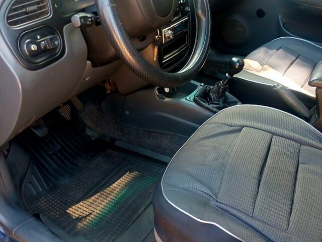 Синий Дэу Ланос, объемом двигателя 1.5 л и пробегом 202 тыс. км за 1500 $, фото 6 на Automoto.ua