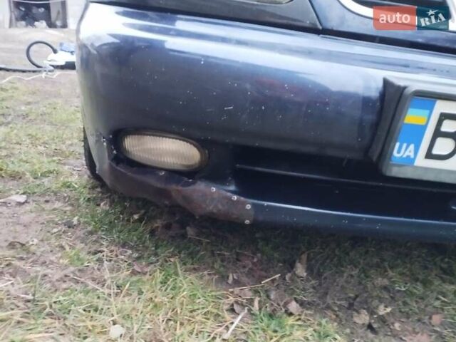 Синий Дэу Ланос, объемом двигателя 1.5 л и пробегом 217 тыс. км за 2200 $, фото 8 на Automoto.ua