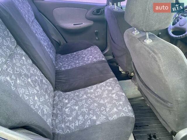 Синий Дэу Ланос, объемом двигателя 1.5 л и пробегом 212 тыс. км за 2350 $, фото 13 на Automoto.ua