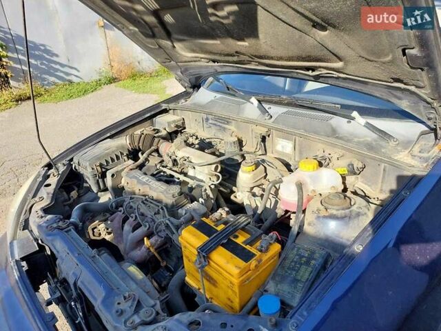 Синій Деу Ланос, об'ємом двигуна 1.5 л та пробігом 250 тис. км за 2800 $, фото 3 на Automoto.ua
