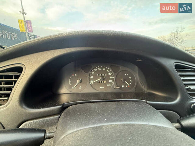 Синий Дэу Ланос, объемом двигателя 1.5 л и пробегом 340 тыс. км за 2400 $, фото 8 на Automoto.ua