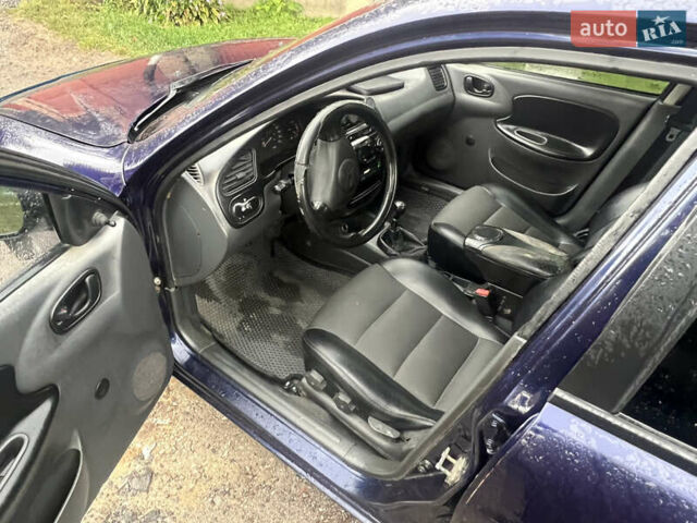 Синій Деу Ланос, об'ємом двигуна 0 л та пробігом 450 тис. км за 1500 $, фото 5 на Automoto.ua