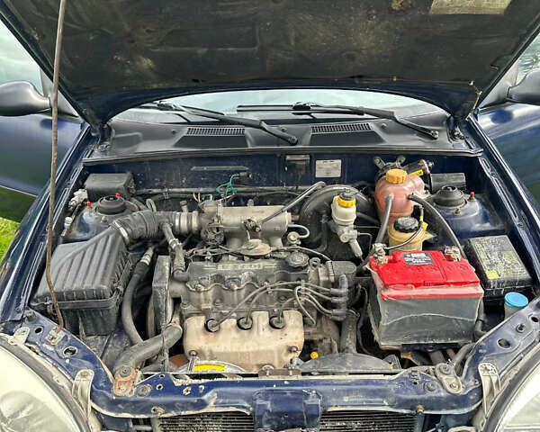 Синій Деу Ланос, об'ємом двигуна 1.6 л та пробігом 280 тис. км за 1350 $, фото 7 на Automoto.ua