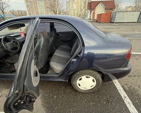 Синий Дэу Ланос, объемом двигателя 1.5 л и пробегом 340 тыс. км за 2400 $, фото 4 на Automoto.ua