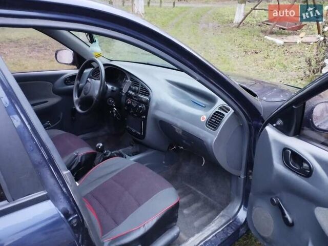 Синий Дэу Ланос, объемом двигателя 1.5 л и пробегом 217 тыс. км за 2200 $, фото 16 на Automoto.ua