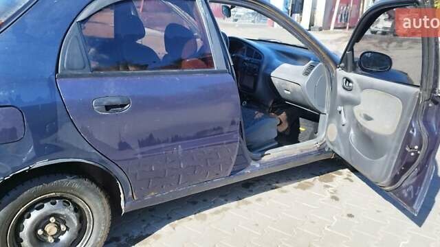Синий Дэу Ланос, объемом двигателя 1.5 л и пробегом 300 тыс. км за 1150 $, фото 3 на Automoto.ua