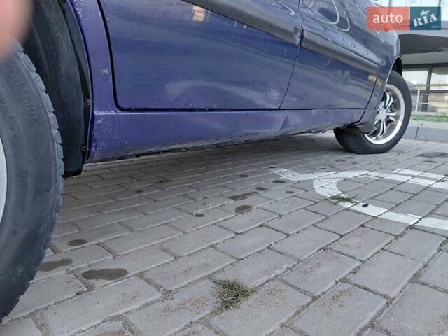 Синий Дэу Ланос, объемом двигателя 1.5 л и пробегом 301 тыс. км за 2450 $, фото 11 на Automoto.ua