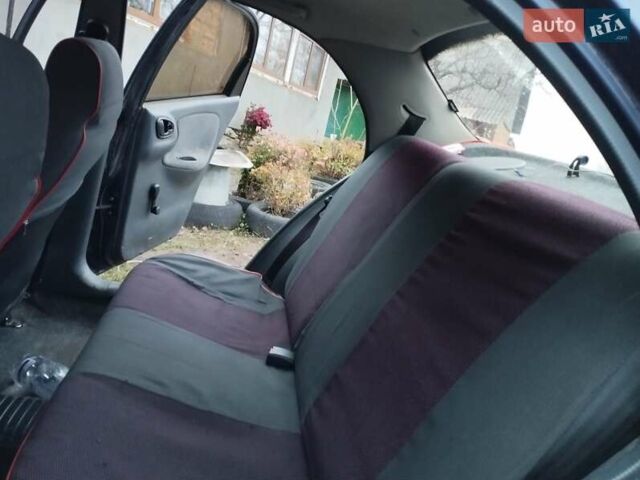 Синий Дэу Ланос, объемом двигателя 1.5 л и пробегом 217 тыс. км за 2200 $, фото 19 на Automoto.ua