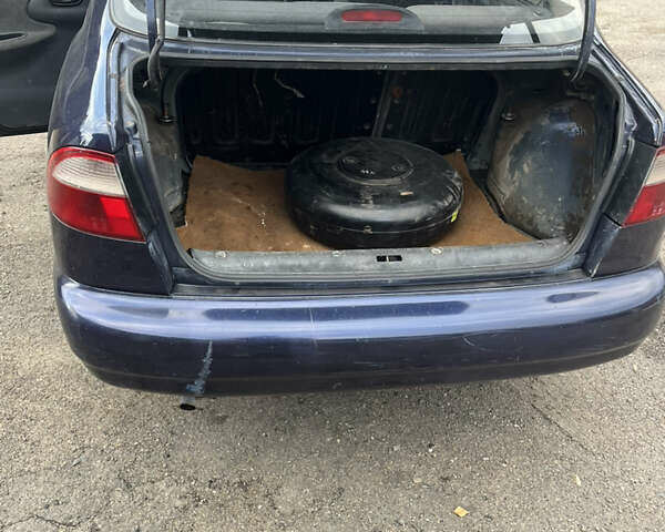 Синій Деу Ланос, об'ємом двигуна 1.5 л та пробігом 200 тис. км за 1250 $, фото 11 на Automoto.ua