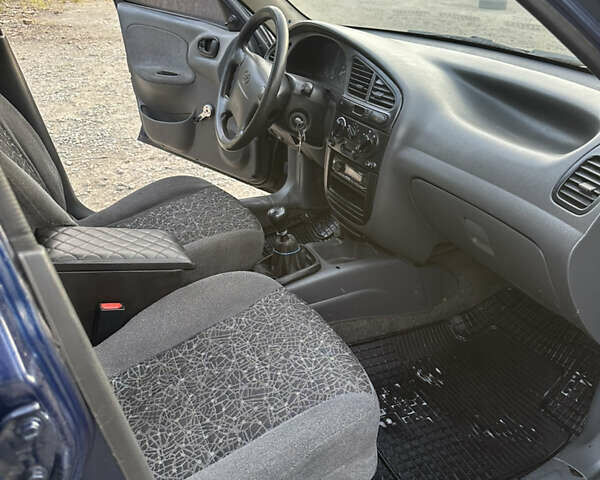 Синій Деу Ланос, об'ємом двигуна 1.5 л та пробігом 250 тис. км за 1400 $, фото 14 на Automoto.ua