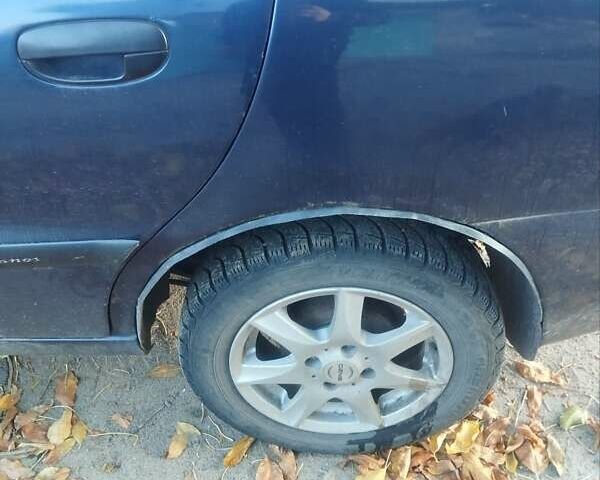 Синий Дэу Ланос, объемом двигателя 1.5 л и пробегом 300 тыс. км за 2000 $, фото 8 на Automoto.ua