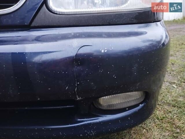 Синий Дэу Ланос, объемом двигателя 1.5 л и пробегом 217 тыс. км за 2200 $, фото 9 на Automoto.ua