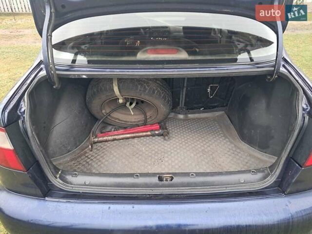 Синій Деу Ланос, об'ємом двигуна 1.5 л та пробігом 240 тис. км за 2099 $, фото 6 на Automoto.ua