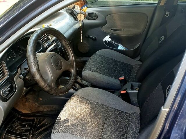 Синій Деу Ланос, об'ємом двигуна 1.5 л та пробігом 300 тис. км за 1250 $, фото 6 на Automoto.ua