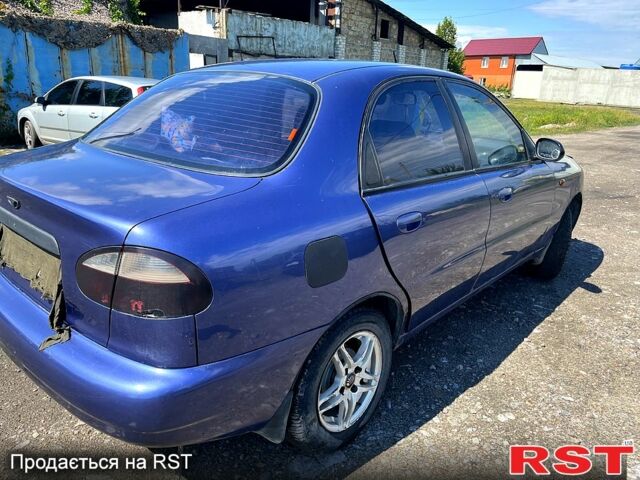 Синій Деу Ланос, об'ємом двигуна 1.3 л та пробігом 272 тис. км за 1600 $, фото 4 на Automoto.ua