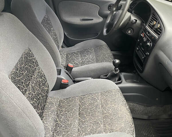 Синий Дэу Ланос, объемом двигателя 1.5 л и пробегом 191 тыс. км за 2100 $, фото 4 на Automoto.ua