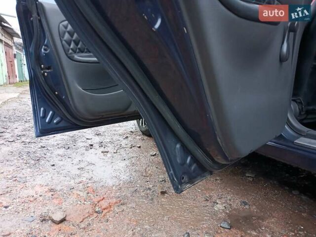 Деу Ланос 2006 у Харкові на Automoto.ua Синій Деу Ланос, об'ємом двигуна 1.5 л та пробігом 173 тис. км за 2790 $, фото 22 на Automoto.ua