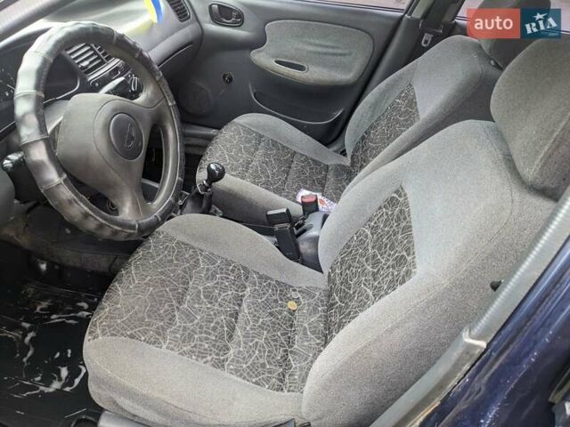 Синий Дэу Ланос, объемом двигателя 1.5 л и пробегом 172 тыс. км за 1450 $, фото 12 на Automoto.ua