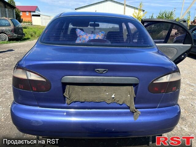 Синій Деу Ланос, об'ємом двигуна 1.3 л та пробігом 272 тис. км за 1600 $, фото 3 на Automoto.ua