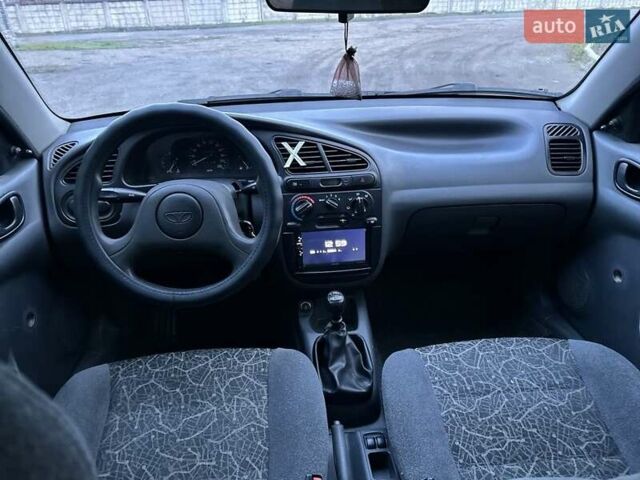 Синий Дэу Ланос, объемом двигателя 1.5 л и пробегом 230 тыс. км за 2400 $, фото 8 на Automoto.ua