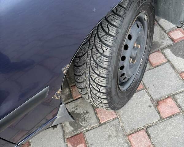 Синий Дэу Ланос, объемом двигателя 1.5 л и пробегом 235 тыс. км за 2350 $, фото 8 на Automoto.ua