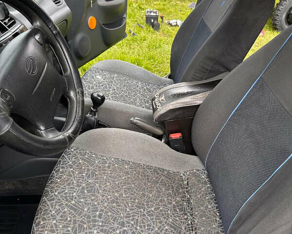 Синій Деу Ланос, об'ємом двигуна 1.6 л та пробігом 280 тис. км за 1350 $, фото 6 на Automoto.ua