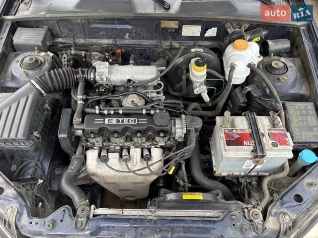 Синий Дэу Ланос, объемом двигателя 1.5 л и пробегом 235 тыс. км за 2350 $, фото 9 на Automoto.ua