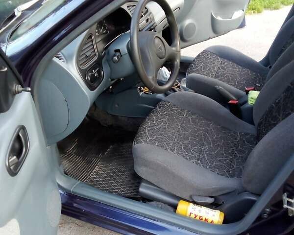 Синий Дэу Ланос, объемом двигателя 1.5 л и пробегом 213 тыс. км за 2900 $, фото 4 на Automoto.ua