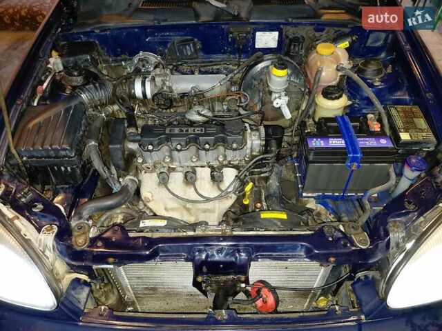 Синій Деу Ланос, об'ємом двигуна 1.5 л та пробігом 301 тис. км за 2650 $, фото 10 на Automoto.ua