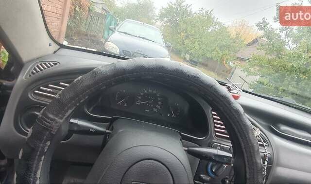 Синий Дэу Ланос, объемом двигателя 1.5 л и пробегом 200 тыс. км за 2100 $, фото 1 на Automoto.ua