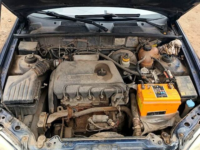 Синий Дэу Ланос, объемом двигателя 1.3 л и пробегом 153 тыс. км за 2000 $, фото 6 на Automoto.ua